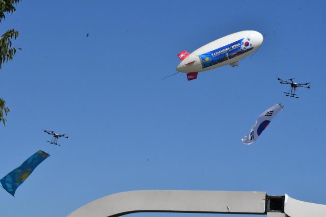 A blimp bearing the flags of Kazakhstan and South Korea flies above Yeouido Hangang Park as drones carry the two countries flags during the Korea-Kazakhstan Cultural Heritage Exchange a side event of the 2026 Korea-Central Asia Summit in Seoul on Sept 16 2026 AJP Joonha Yoo