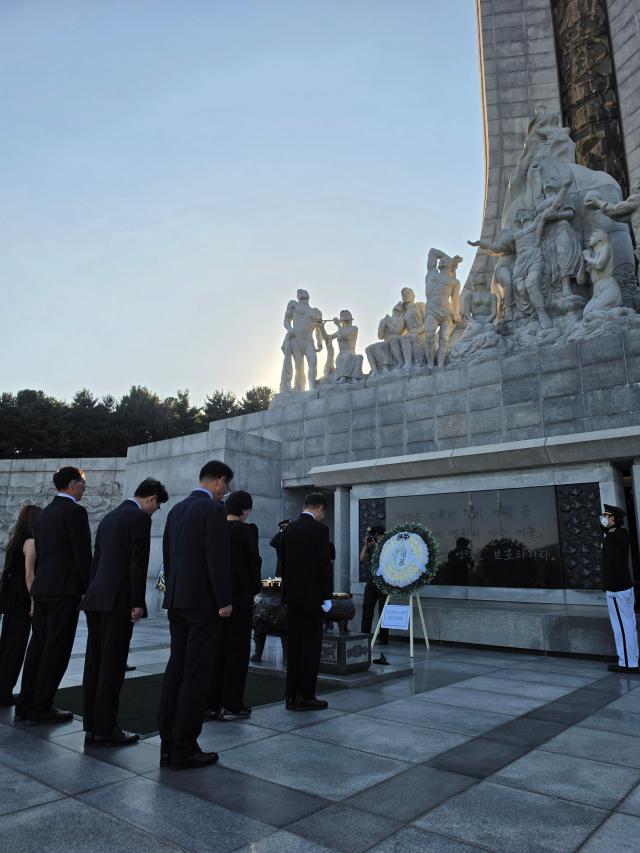 Kazakhstans Minister of Culture and Information Arman Kyrykbayev observes a moment of silence in front of the Memorial Tower at Daejeon National Cemetery on Sept 16 2026 AJP Park Sae-jin