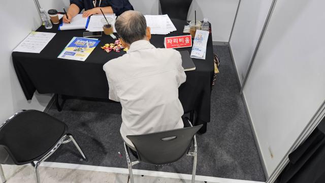 Yu Joo-chan 79 fills out a résumé during the Seoul Senior Job Fair 2026 at the aT Center in Seocho-gu Seoul Sept 17 2026 Yu who previously worked in telecommunications and apartment management said finding stable work has become increasingly difficult with age AJP Lee Jung-woo