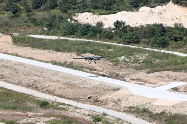 A short takeoff and landing unmanned aircraft takes off from a runway during the 2026 Defense Drone Technology Exhibition at the Seungjin Training Ground in Pocheon Gyeonggi Province on Sept 16 2026 Courtesy of the state-run Kookbang Ilbo
