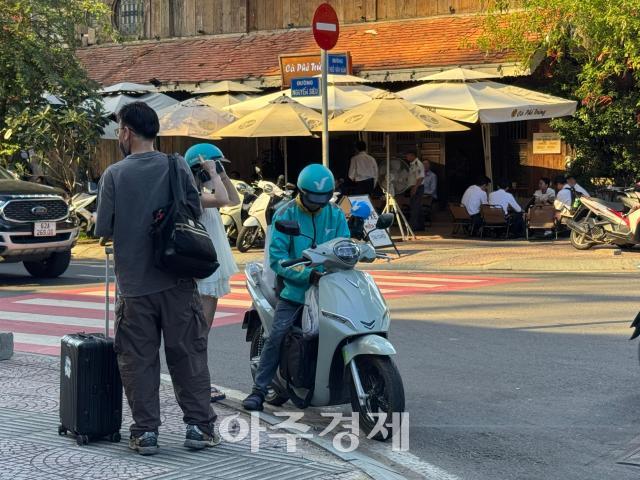 호찌민 시내에서 배달하는 기사 사진김혜인 통신원