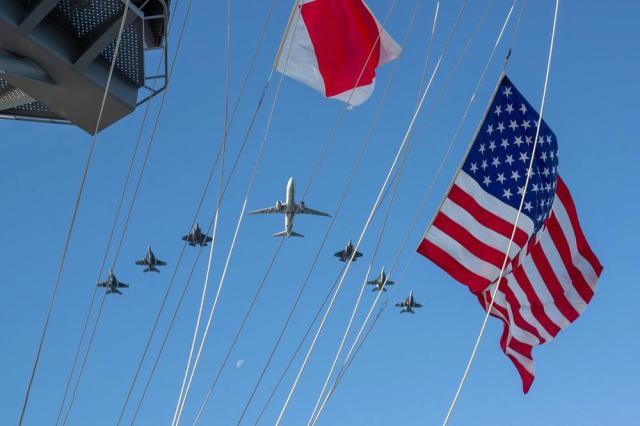 Aircraft from Carrier Air Wing CVW 5 and a Republic of Korea Navy P-8A Poseidon maritime patrol aircraft fly USS George Washington CVN 73 while participating Carrier Strike Group Exercise CSGEX while at sea on Nov 12 2025 US Navy photo by Mass Communication Specialist 2nd Class Lillian Olen