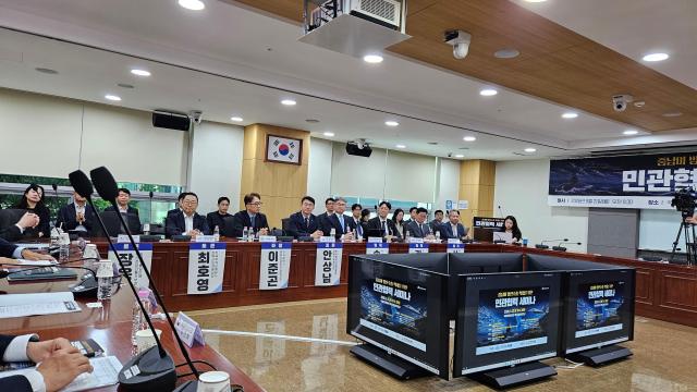Executives from South Korean defense companies scheduled to give presentations listen as Rep Min Hong-chul delivers opening remarks at a public-private seminar on expanding defense exports to Latin America at the National Assembly Members Office Building in Seoul on Sept 21 2026 AJP Lee Jung-woo 