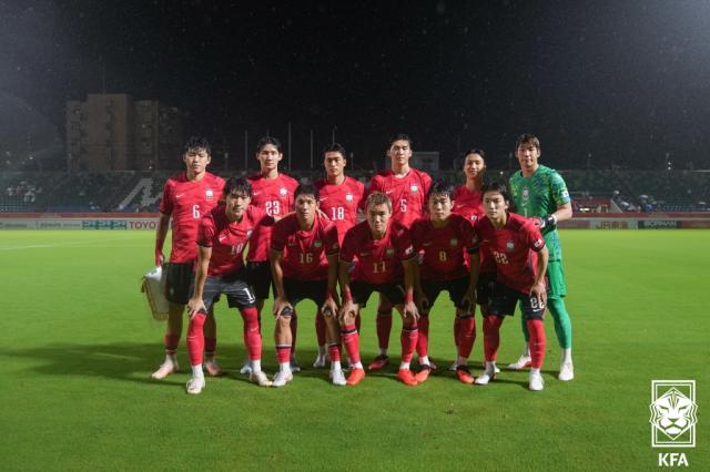 South Korean footballers pose for a group photo ahead of an opening match against Qatar at the Asian Games in Japan on Sept 15 2026 Courtesy of the Korea Football Association KFA