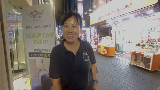 A woman in her 50s from Gangdong District eastern Seoul speaks with AJP during a street interview in central Seoul on Sept 22 2026 AJP Kim Hee-su