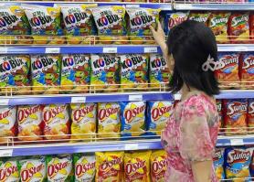 Orion, chiến lược tiếp thị toàn cầu với bao bì tiếng Hàn cho bánh snack