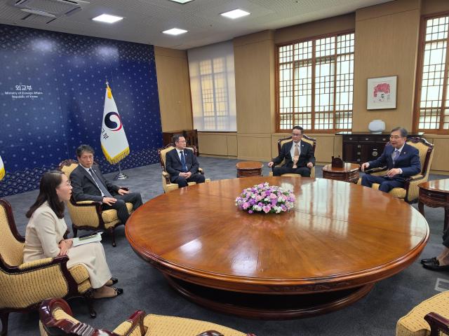 Foreign Minister Cho Hyun right speaks during a meeting with the new leadership of the Trilateral Cooperation Secretariat at the foreign ministry in Seoul on Sept 29 2026 AJP Park Sae-jin
