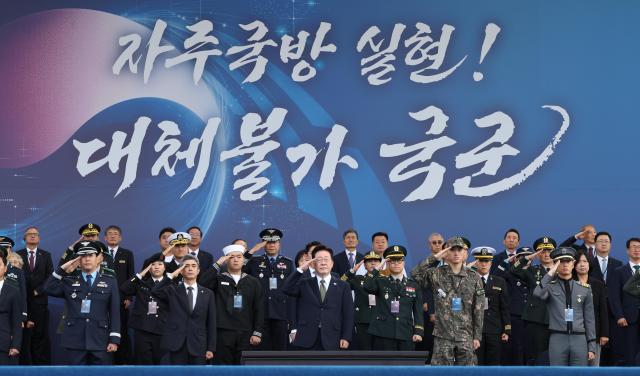 President Lee Jae Myung salutes during a ceremony marking the 78th Armed Forces Day at the Gyeryongdae military headquarters in South Chungcheong Province on Oct 1 2026 Pool photo