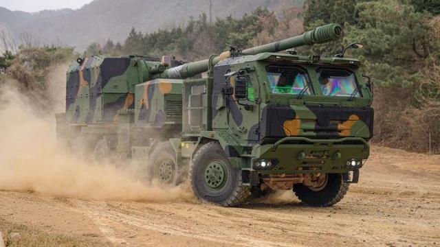 A K9MH wheeled self-propelled howitzer developed by South Korean defense company Hanwha Aerospace undergoes testing Hanwha signed a contract with the US Army in August 2026 to supply six prototypes with an option for 12 more marking the first US export of the Korean-made artillery system Courtesy of Hanwha Aerospace