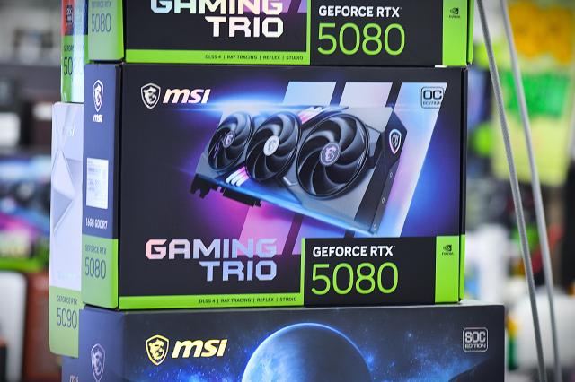Boxes of MSI GeForce RTX 5080 Gaming Trio OC Edition graphics cards are displayed at a shop in the Yongsan Electronics Market in Seoul.AJP Joonha Yoo