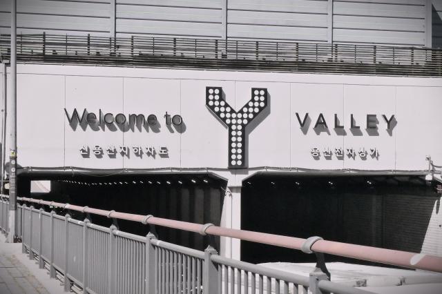 A Welcome to Y Valley sign is displayed at the entrance of an underpass near the Yongsan Electronics Market in Seoul AJP JoonhaYoo