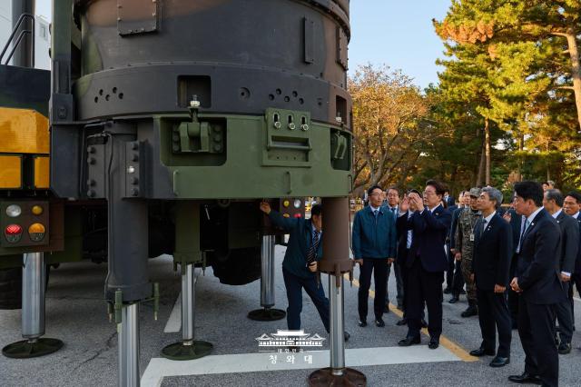 South Korean President Lee Jae Myung inspects the Hyunmoo-5 high-power missile after observing the successful test launch of a domestically developed hypersonic glide vehicle on October 8 2026 Courtesy of Cheong Wa Dae