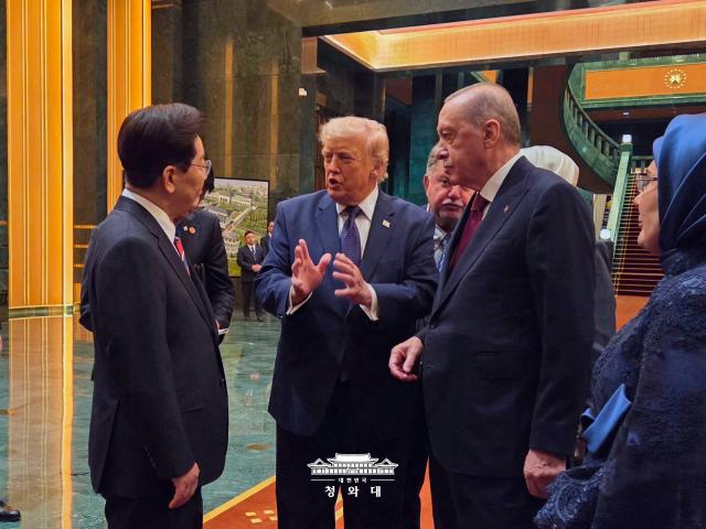 South Korean President Lee Jae Myung left speaks with US President Donald Trump center as Turkish President Recep Tayyip Erdogan right looks on during a dinner hosted by Erdogan on the sidelines of the NATO summit at the Beştepe Presidential Complex in Ankara Türkiye on July 7 2026 Courtesy of Cheong Wa Dae