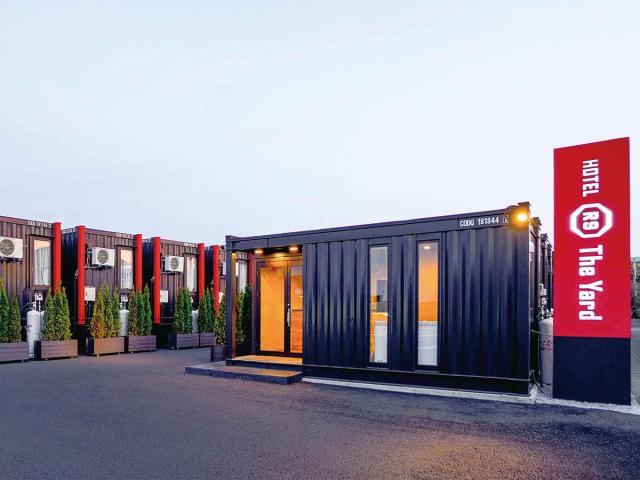 Japanese chain HOTEL R9 The Yard utilizing container-style room modules Courtesy of Develop