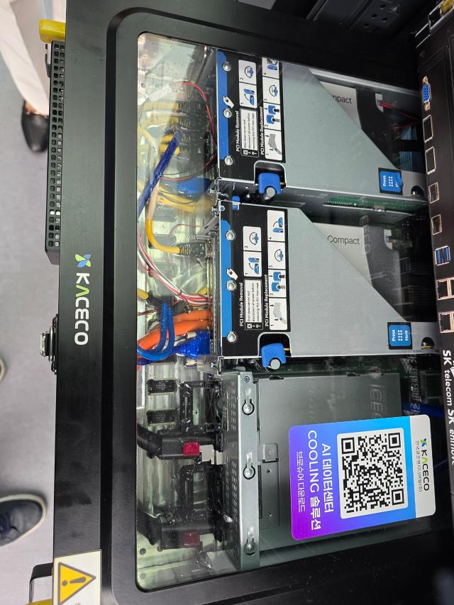 SK Groups demonstration of fluid immersed AI data center cooling solution showcased at the APEC 2025 Korea held in Gyeongju Oct 30 2025 AJP Kim Dong-young