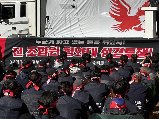 KAI union members gather in front of a stage during a rally near Cheong Wa Dae in Seoul on October 14 2026 demanding government intervention over Hanwha Groups growing influence on the aircraft manufacturer AJP Kim Hee-su