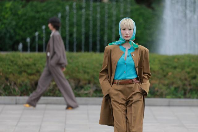 A model walks the runway in an outfit from Miss Gee Collections 2027 springsummer collection at the Seoul Arts Center in southern Seoul on Oct 15 2026 Aju Business Daily Yoo Dae-gil