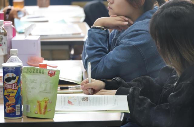 Students study in a classroom at Yeomyung School an accredited alternative school for North Korean defectors and their children in Seouls Gangseo District on Oct 19 2026 As of July 88 of the schools 95 students were born outside North Korea reflecting the growing number of children born in third countries to North Korean defector families AJP Yoo Na-hyun 