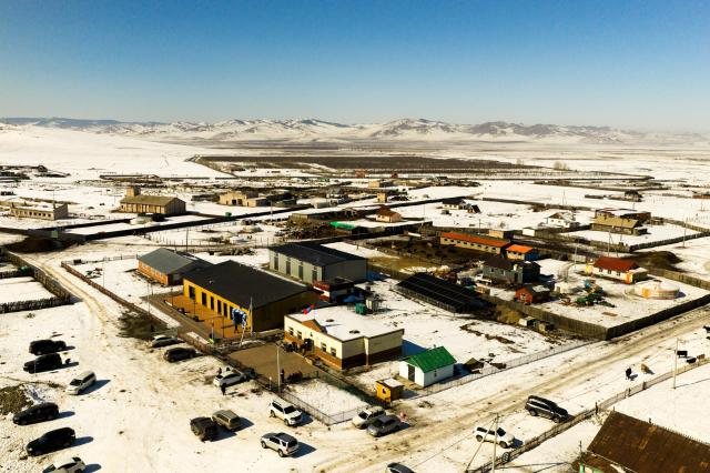 An aerial view shows a newly established primary school surrounded by snow-covered countryside in Udleg bagh Tuv province Mongolia in 2026 Courtesy of UNICEF Mongolia 