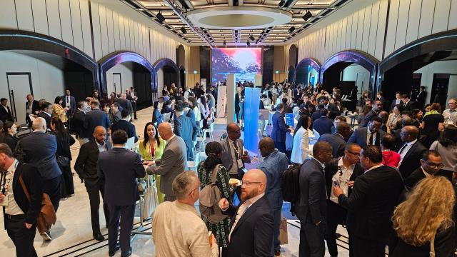 Participants mingle and exchange ideas outside the main conference hall during the World Bank Groups Global AI and Digital Summit at the Grand Hyatt Seoul in Yongsan District Seoul on October 20 2026 The summit brought together approximately 900 participants from around 160 countries including government officials and private-sector representatives making it the largest gathering since the event was launched in 2024 according to South Koreas Ministry of Finance and Economy AJP Lee Jung-woo