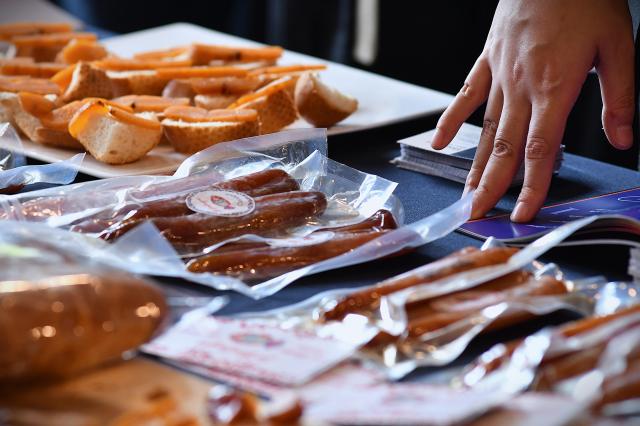 Packaged bottarga and samples served on bread are displayed at Food Experience Korea in Seoul Oct 26 2026 AJP Joonha Yoo
