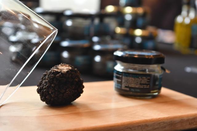 A black truffle sits beside a jar of truffle products at Food Experience Korea in Seoul Oct 26 2026 AJP Joonha Yoo