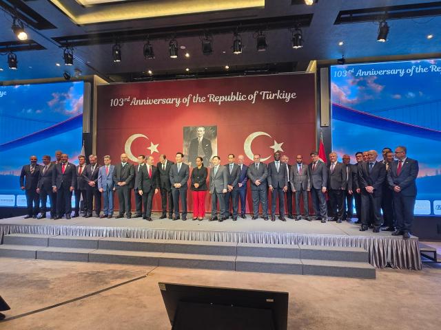Ambassadors and guests pose for a group photo on stage at a reception marking the 103rd anniversary of the proclamation of the Republic of Türkiye at the Ambassador Pullman Hotel in Seoul Oct 26 2026 AJP Park Sae-jin