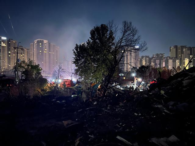 Fire fully extinguished at Guryeong Village in Gangnam district in southern Seoul after 24 hours of firefighting at dawn Oct 28 2026 AJP Joonha Yoo