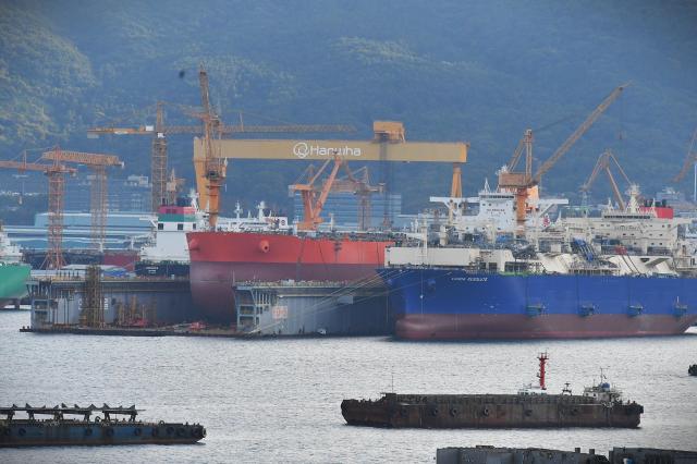 Ships under construction and a floating dock are seen at Hanwha Oceans shipyard in Geoje South Gyeongsang Province on Oct 12 2026 AJP Joonha Yoo
