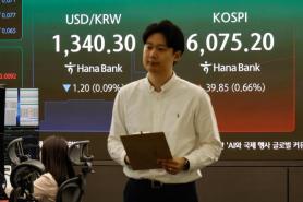Won slides as hawkish Fed concerns lift dollar