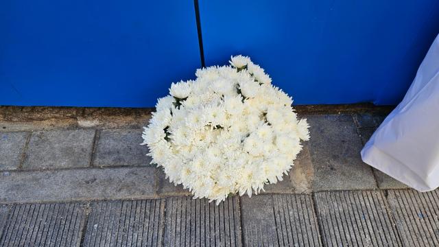 White chrysanthemums are placed at the site of the 2022 Itaewon crowd crush in Seouls Yongsan District on October 28 2026 a day before the fourth anniversary of the disaster In South Korea white chrysanthemums are traditionally offered at funerals and memorials as symbols of mourning and respect for the deceased AJP Lee Jung-woo 