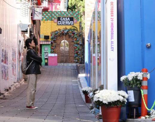 Families return to a quiet Itaewon alley with unanswered questions