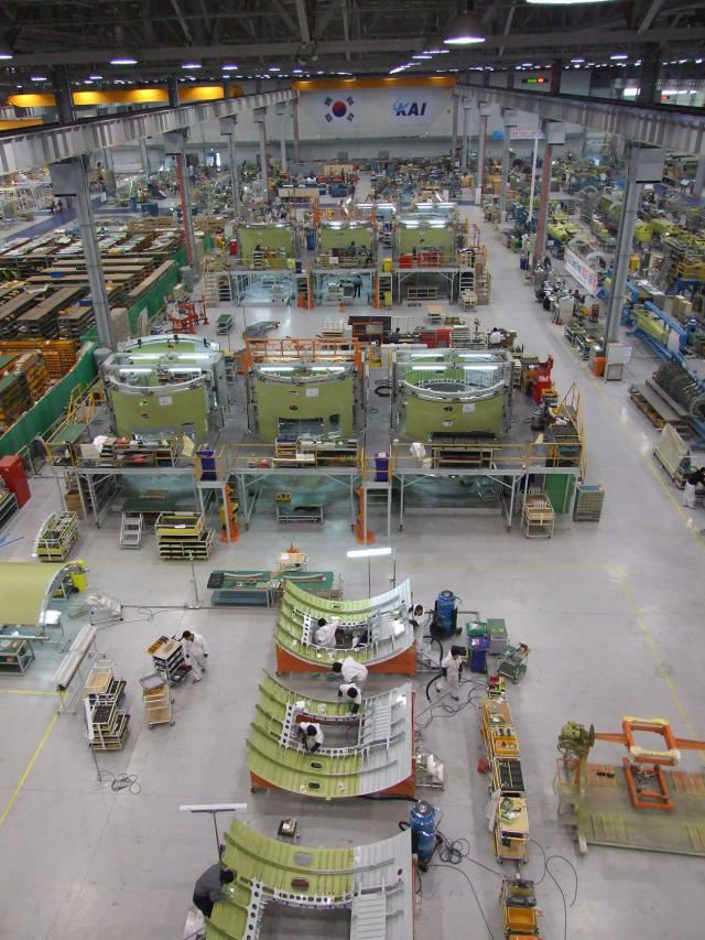 Workers assemble Airbus A321 fuselage sections at Korea Aerospace Industries KAI manufacturing facility in Sacheon South Korea Courtesy of KAI
