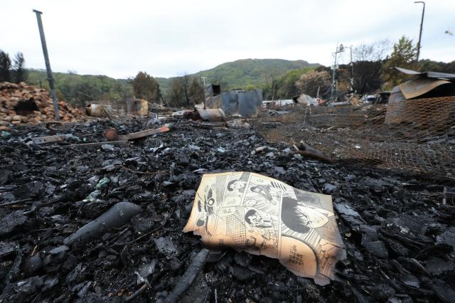 A day after the fire: Guryong Village in the aftermath