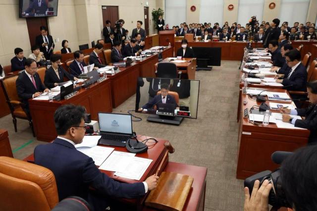 Rep Jin Seong-joon chairman of South Koreas National Assembly National Defense Committee presides over a parliamentary audit while holding a gavel at the National Assembly in Seoul on Oct 26 2026 Courtesy of Rep Jin Seong-joon 