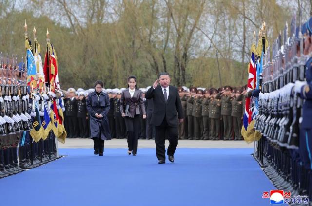 North Korean leader Kim Jong-un accompanied by his wife and daughter visits a weapons exhibition at an undisclosed location on Oct 29 2026 in this photo released by the state-run North Korean Central News Agency KCNA the following day